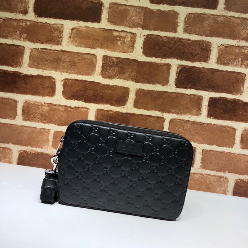 G*u*i clutch bags